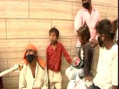 Amid dust storm and light rains, people continue to migrate