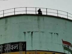 UP: Man under the influence of liquor climbs atop water tank 