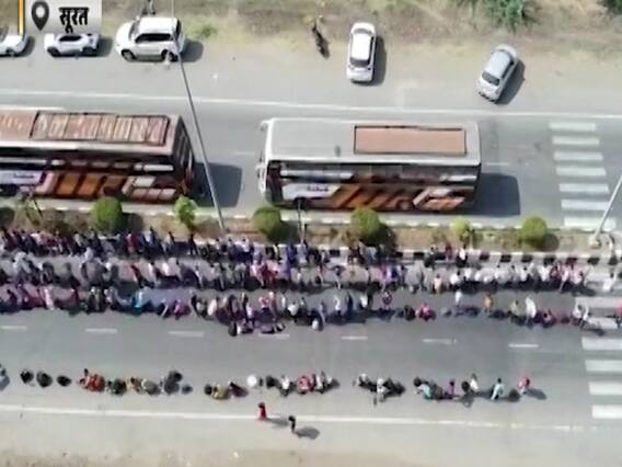 Surat: Aerial view of migrants standing in long queue for transport