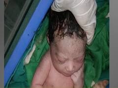 Migration woes: Woman delivers baby on road