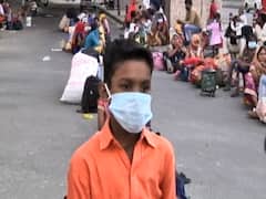 Noida: As states start bus services, migrants in long queues wait for their turn