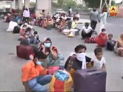 Lockdown 4.0: घर जाने के लिए बसों की इंतजार में बैठे लोग, देखिए ये रिपोर्ट