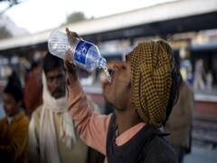 Watch migrants steal water bottles at Prayagraj railway station