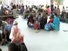 Lucknow: Labourers waiting for bus at Awadh depot