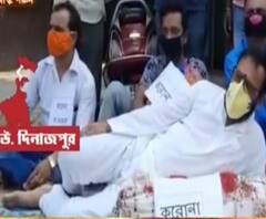 রায়গঞ্জে পাশবালিশ নিয়ে রাস্তায় শুয়ে মুখ্যমন্ত্রীর মন্তব্যের প্রতিবাদ বিজেপি-র, পাল্টা কটাক্ষ তৃণমূলের