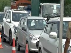 Vehicles crawl due to strict checking at sealed borders of Noida, Delhi