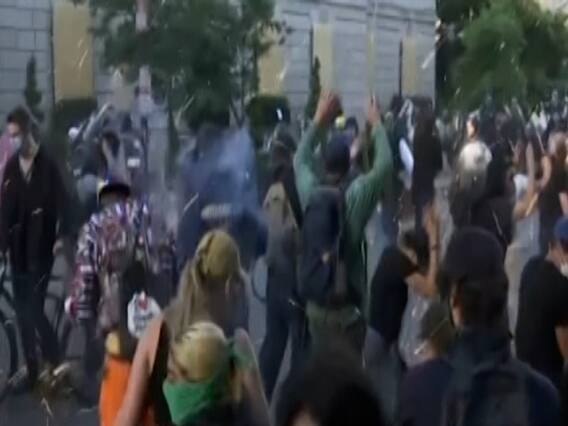 Tear gas, flash bangs used near White House to clear thousands of protesters