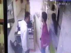 Surat: Cop misbehaves with a bank employee, caught on camera