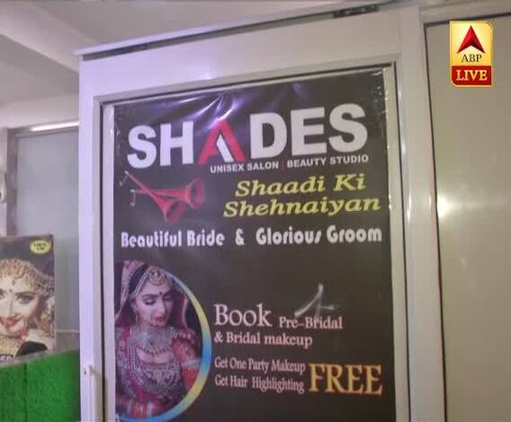 Delhi: Salon staff wears PPE kits as safety precautions