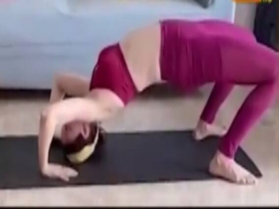 Saumya Tandon performs Yoga with her son