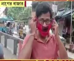 মাস্ক কোথায়? 'এই তো পকেটে'.. কখনও হাতে, কখনও থুতনিতে, এমনই ছবি নাগেরবাজার অঞ্চলে