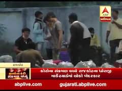 કોરોના મહામારી વચ્ચે રાજકોટના ધોરાજી માર્કેટયાર્ડમાં લોકો બેદરકાર, જુઓ વીડિયો 