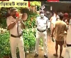 রাজ্য সরকারের নির্দেশে আগামীকাল থেকে সপ্তাহে দু’দিন লকডাউন, গড়িয়াহাট পুর বাজারে সচেতনতামূলক প্রচার পুলিশের