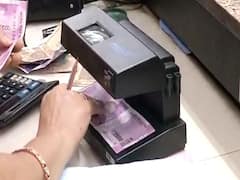 CST staff uses UV machines to kill germs on currency notes