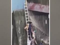 Mumbai: Fire Brigade team saves woman from drowning in river