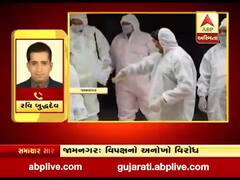 જામનગરમાં મનપાની બોર્ડની બેઠકમાં અનોખો વિરોધ, વિપક્ષના સભ્યો PPE કિટ પહેરીને પહોંચ્યા