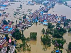 चीन में बाढ़ से तबाही, कई शहर बने टापू