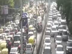 Delhi में बारिश के बाद लगा भारी ट्रैफिक जाम