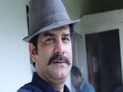 JD Majethia & team of Bhakharwadi uses umbrella for social distancing