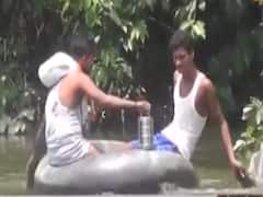 Sitamarhi: Locals use tyre tubes as boats, slippers as paddle