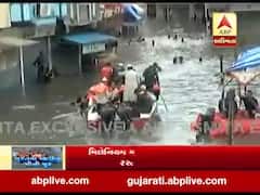 સુરત: ખાડીપૂરના કારણે પૂરગ્રસ્ત વિસ્તારની મદદે આવી સમાજસેવી સંસ્થાઓ, ફૂડ પેકેટની કરી વહેંચણી