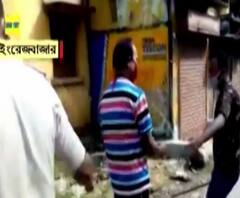 মালদার ইংরেজবাজারে পুলিশের ধরপাকড়, বাজার ফেলে পালাল বিক্রেতারা! ২ জন আটক