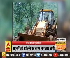 बागेश्वर : मलबे में फंस गई जेसीबी, काफी मशक्कत के बाद ड्राइवर ने निकाला