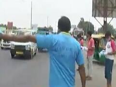 અમદાવાદઃ એસપી રિંગ રોડ પરથી પસાર થતા લોકોને અપાયા વિનામૂલ્યે માસ્ક, જુઓ વીડિયો