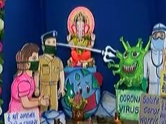 અમદાવાદઃ અમરાઇવાડીના આદર્શ એપાર્ટમેન્ટમાં કોરોના વોરિયર્સ થીમ ગણેશોત્સવની ઉજવણી