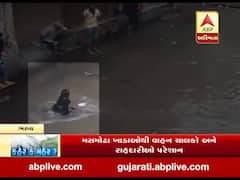 ભરુચના ગાંધી બજારમાં વદ્ધ અને બાળકી ખાડામાં ખાબકી, જુઓ વીડિયો 