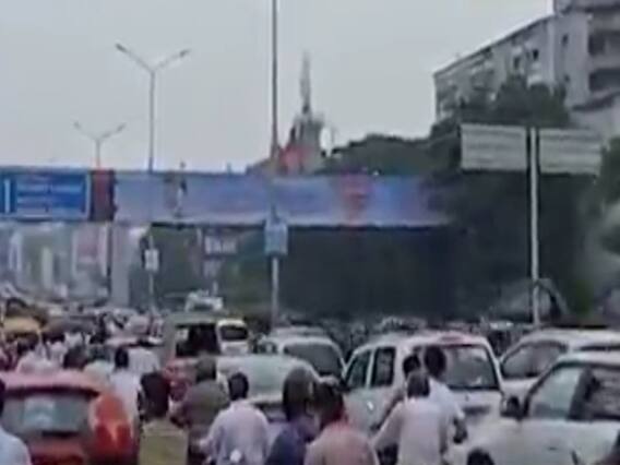 સુરતમાં બિસ્માર રસ્તાઓને લઇ ટ્રાફિક જામ, એક કિલોમીટર સુધી લાગી વાહનોની કતાર