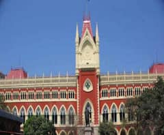 করোনায় মৃতের ময়নাতদন্ত না হলে স্যানিটাইজ করে পরিবারকে দিয়ে দিতে হবে দেহ, নির্দেশ হাইকোর্টের