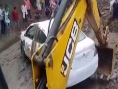 Rajasthan में नदी में बह रही कार को निकाला गया, लेकिन यात्रियों का पता नहीं