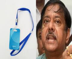 ‘জাপানি মাল’, করোনা ঠেকাতে মন্ত্রীর গলায় এয়ার স্টেরিলাইজেশন কার্ড, কাজ হয়? 