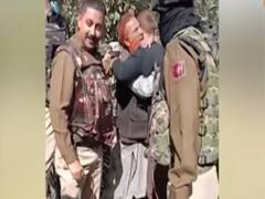 J&K: Uncle touches Security Forces' feet for uniting terrorist with family