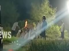 Hathras Case: Victim's family members perform last rites 