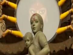 Goddess Durga's idol depicting the life of a migrant mother