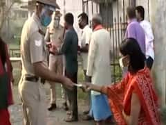 Bihar Polls 2020: People follow COVID-19 norms at polling booths