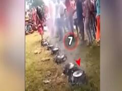 Madhya Pradesh: Woman walks on 7 hot pans