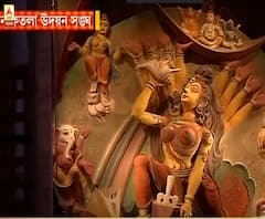 শিরোনাম : ষষ্ঠীর রাতের চেনা ভিড়ের ছবি উধাও, দূর থেকেই হল দেবী দর্শন