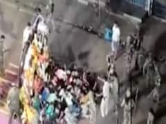 Bihar: Visuals of police's lathicharge on people sitting near Durga idol 