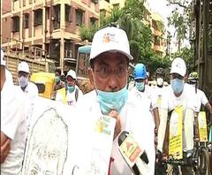 করোনা রুখতে উত্‍সব হোক বাড়িতে বসেই, সাইকেল র‍্যালি করে সচেতনতার বার্তা ‘কোভিড কেয়ার নেটওয়ার্ক’-এর