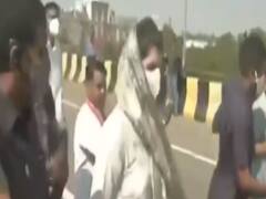 Priyanka & Rahul Gandhi leave on foot for Hathras as Convoy stopped at Yamuna Expressway