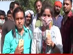 Locals support as police misbehave with ABP News reporter