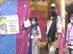 Bihar Polls 2020: Less number of voters at polling booth in Arrah, social distancing observed in Jhajha