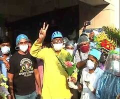 শিকেয় উঠল দূরত্ববিধি, করোনামুক্ত হয়ে হাসপাতাল থেকে ছাড়া পাওয়ার সময়ই সংবর্ধনায় ভেসে গেলেন নির্মল মাঝি