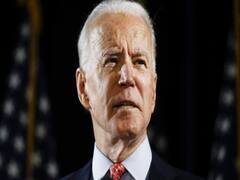 US residents celebrate with pro-Joe Biden chants as he registers thumping victory