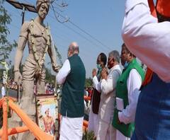 বাঁকুড়ায় কার মূর্তিতে ফুল দিলেন অমিত শাহ? বিরসা মুণ্ডার না অন্য কারও? বিতর্কের জল গড়িয়েই চলেছে 