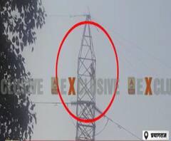 Prayagraj: हाईटेंशन तार के टावर पर चढ़ा युवक, नीचे उतारने की कोशिश जारी| ABPGanga 