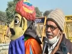 Farmers at Haryana-Rajasthan border sing song to register protest